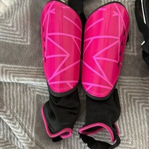 DSG Pink Shin Guards with Black Straps